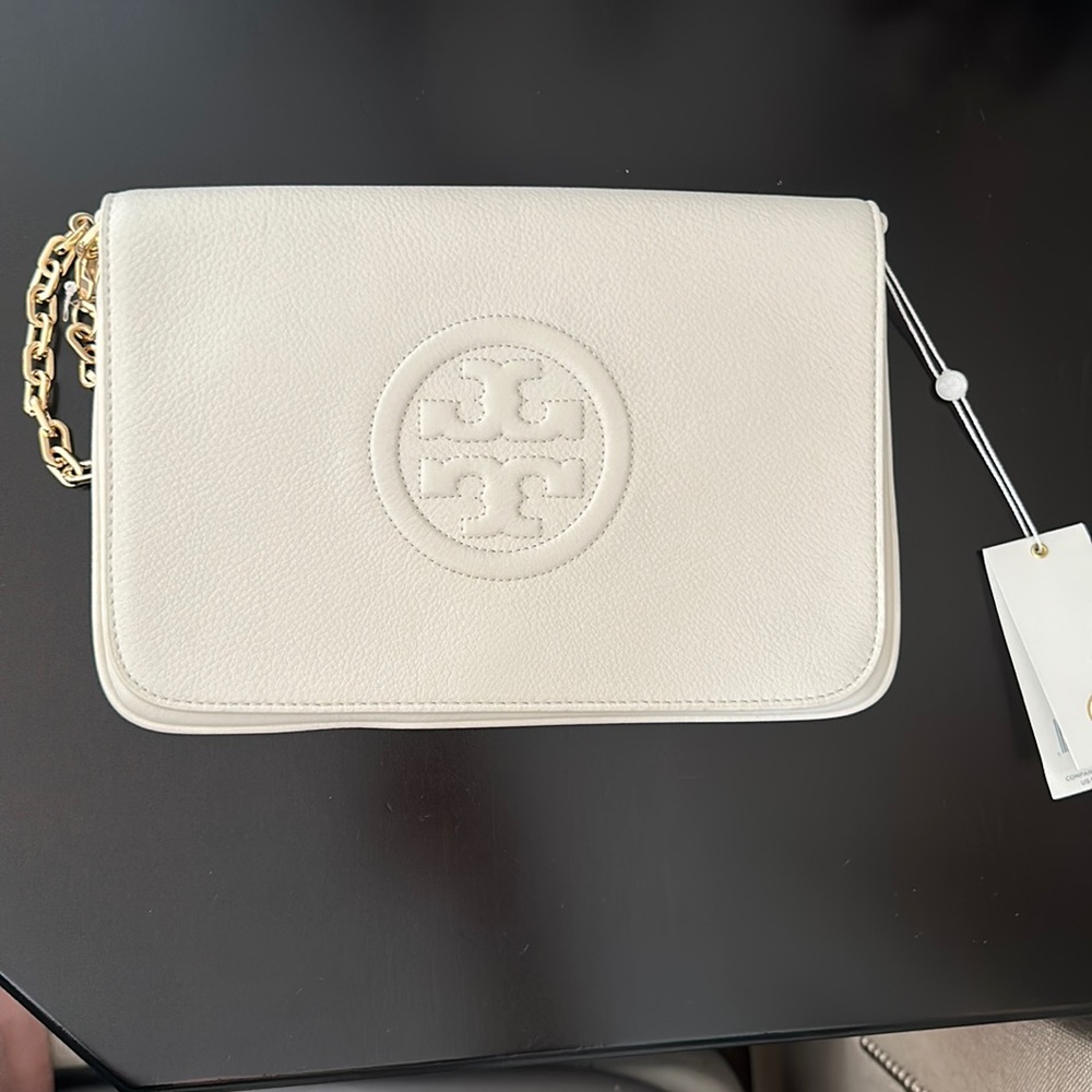 White leather Tory Burch clutch with gold removable strap